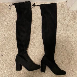 Thigh high black boots
